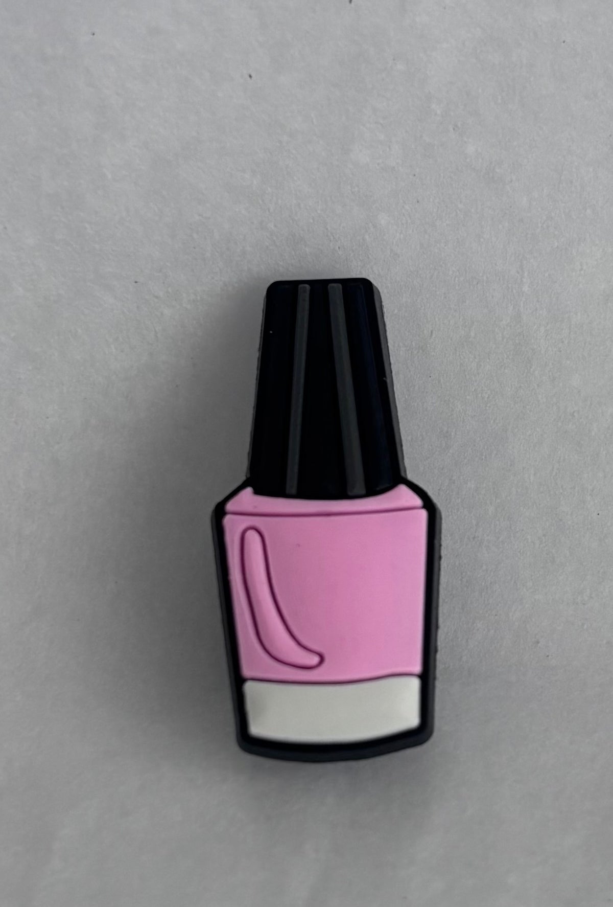 Pink nail polish shoe charm