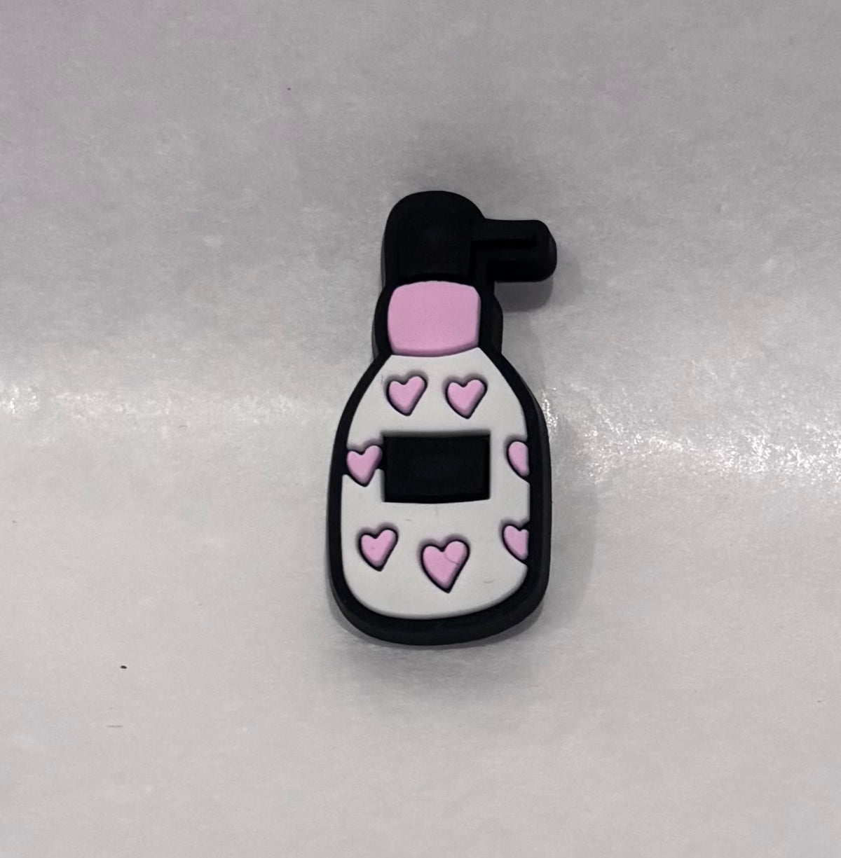 Lotion bottle shoe charm