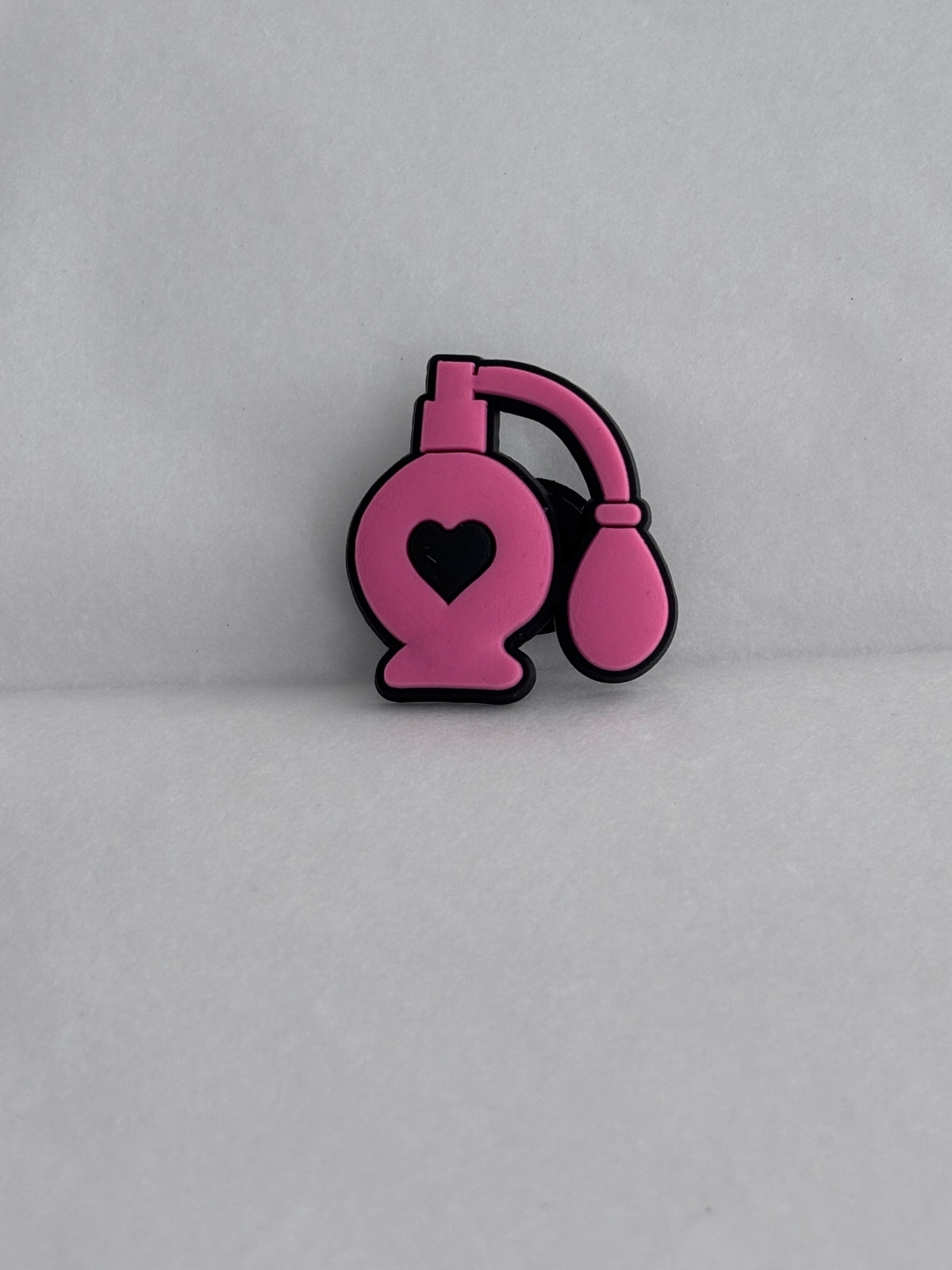 Pink perfume atomiser