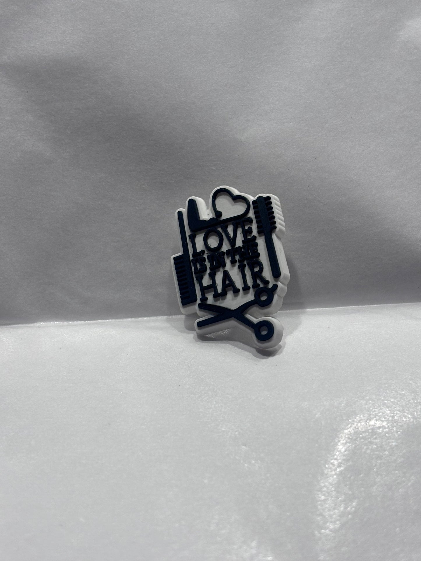 ‘Love is in the hair’ charm