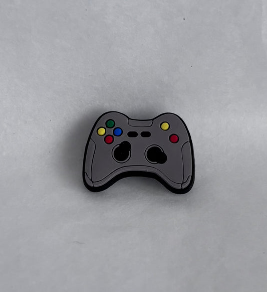 Grey gaming controller shoe charm