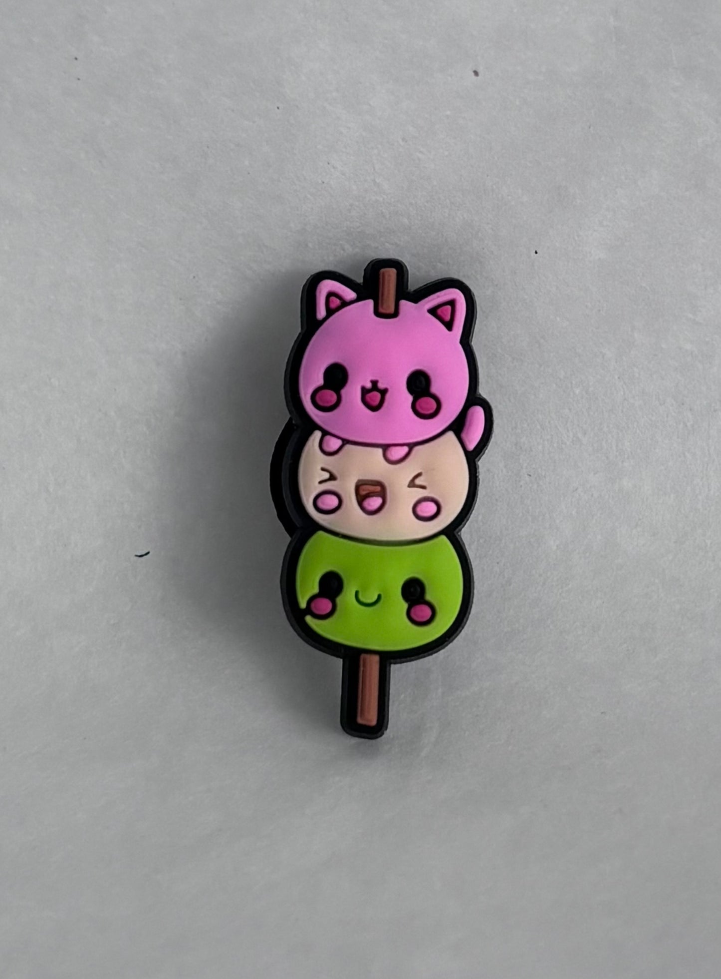 Trio face stick shoe charm