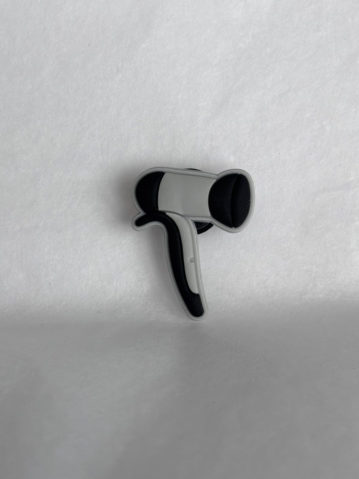 Grey dryer shoe charm