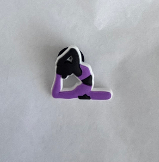 Purple figure yoga pose