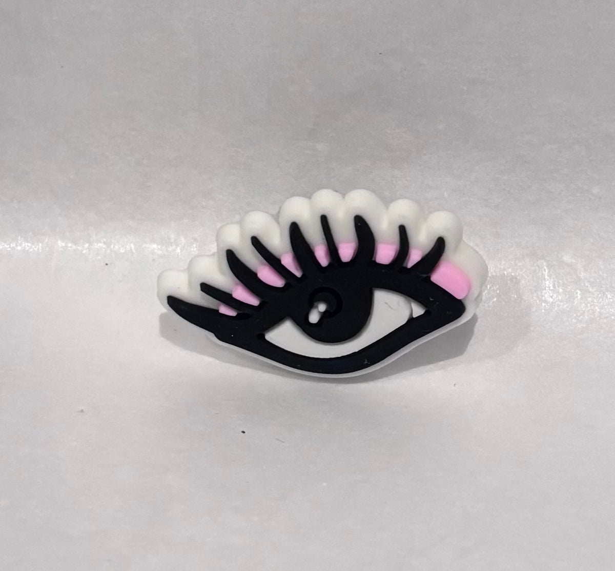 Lash/eye shoe charm