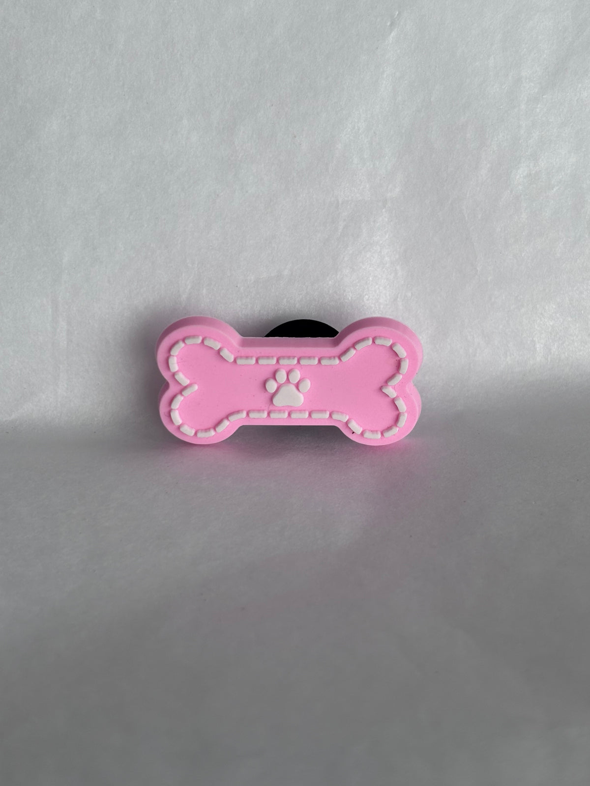 Pink dog bone shoe charm